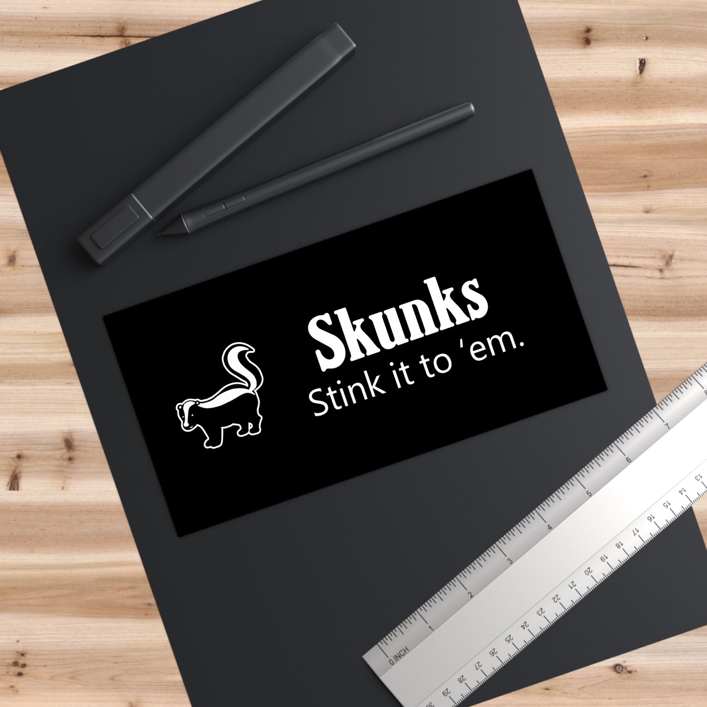 "Stink it to 'em" skunk sticker